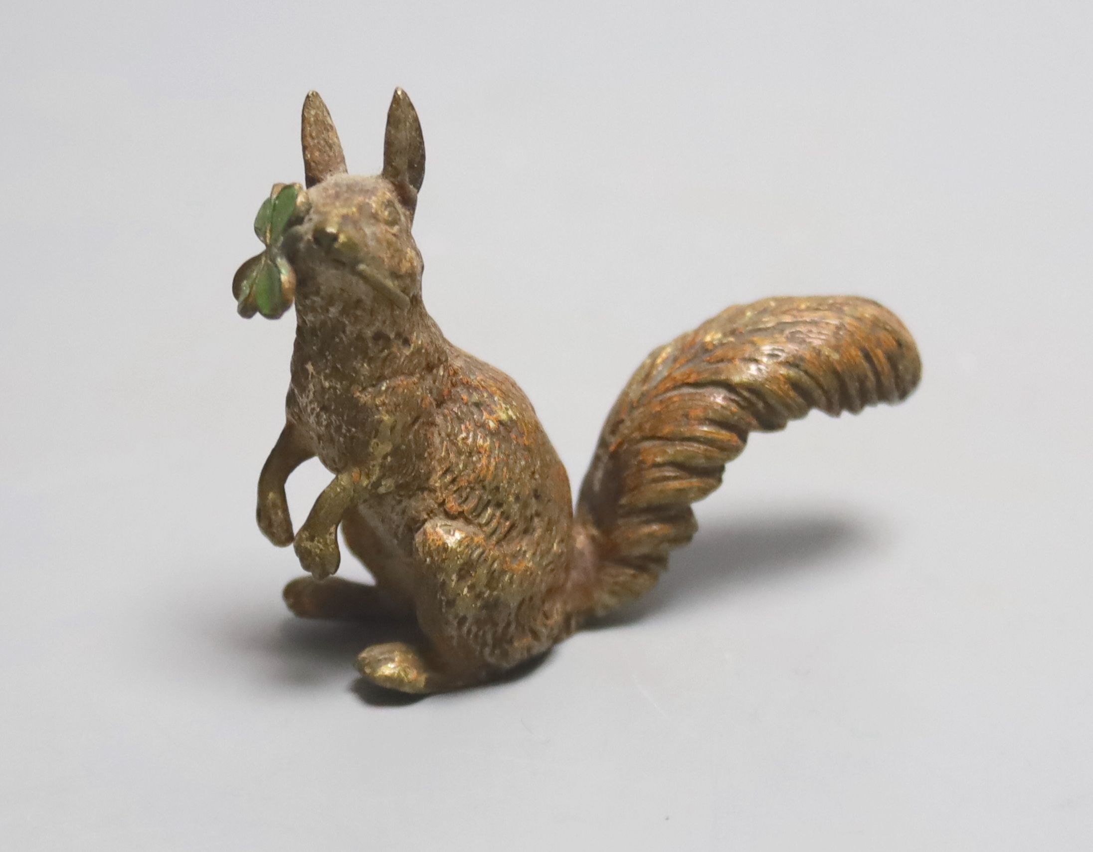 An Austrian cold painted bronze squirrel holding a clover, height 5cm